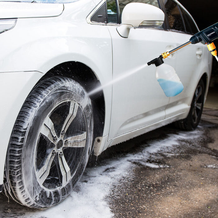 Washing Car Wheel With High Pressure Water