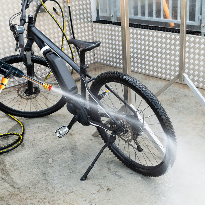 Woman Washing Mountain Bike